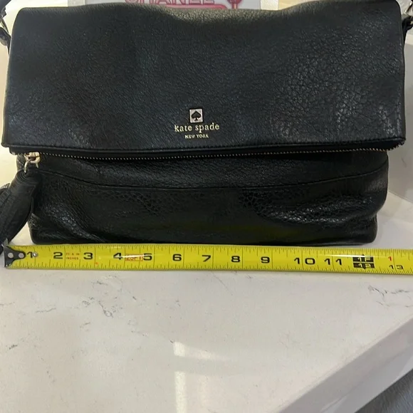 Kate spade everyday purse black leather with removable strap.